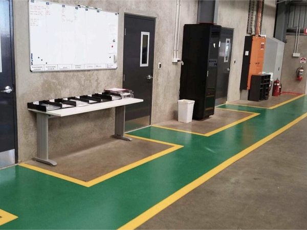 Durable safety lines on a factory floor.