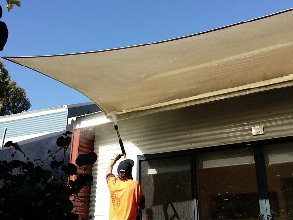 High pressure cleaning on exterior house