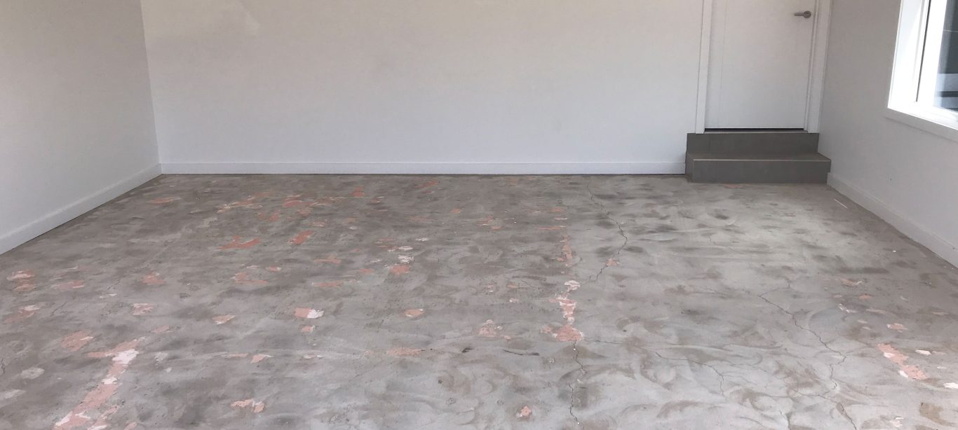 before flake flooring application in garage