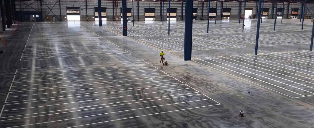 Creating lines in a warehouse where the shelves will be.
